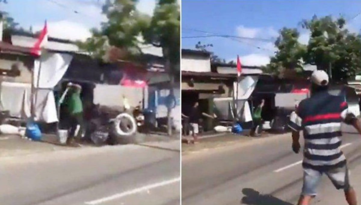 TANGKAP layar video tukang gunting rambut menyerang pelanggan dengan parang. FOTO Agensi