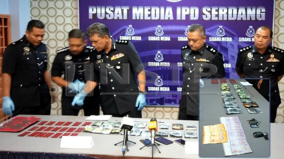 ISMADI (tengah) pada sidang media mengenai rampasan dadah. Gambar kecil) Dadah dan wang tunai yang dirampas. 