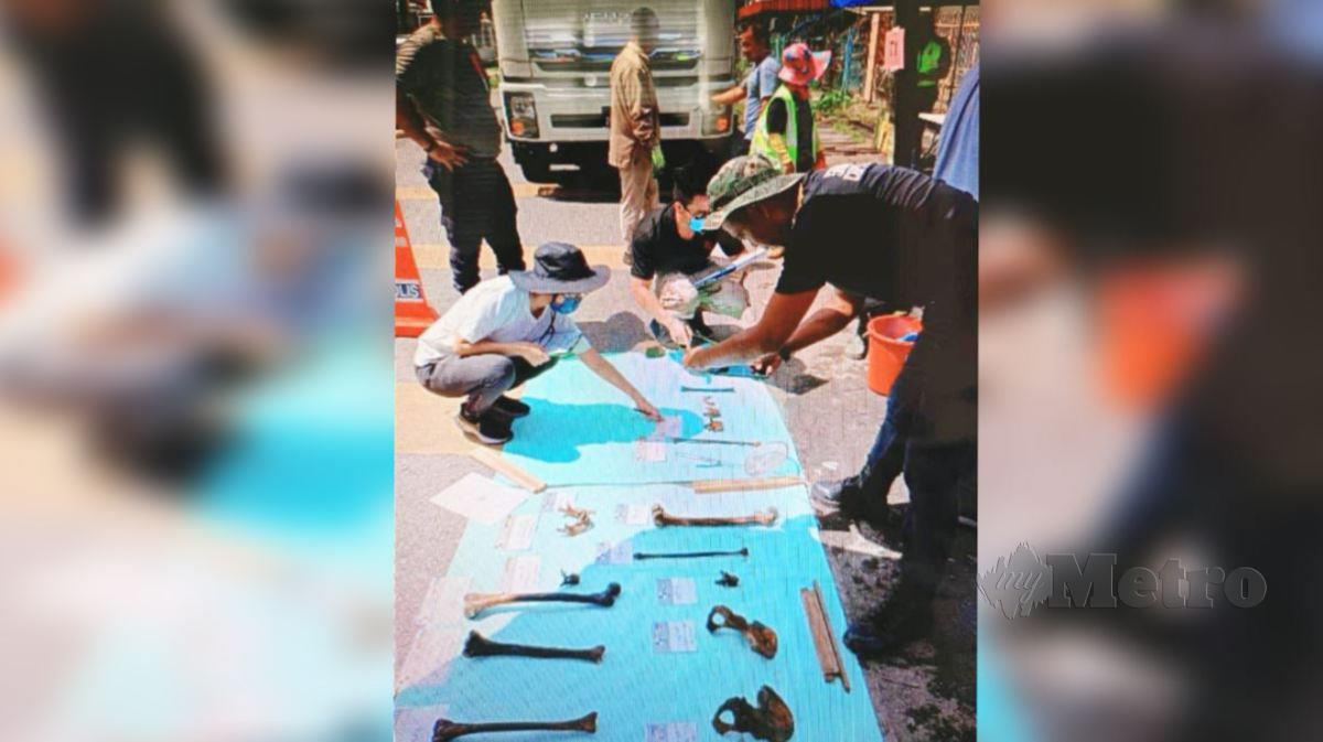 RANGKA manusia yang ditemukan dalam longkang di kawasan perumahan Jalan Bukit Assek. 