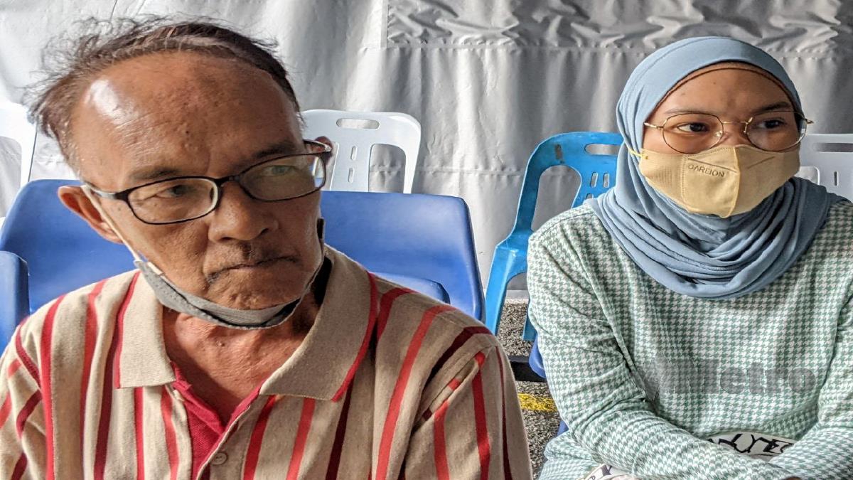 HARRIS bersama anaknya Siti Hadilah ketika ditemui di HPP hari ini. FOTO ZUHAINY ZULKIFFLI