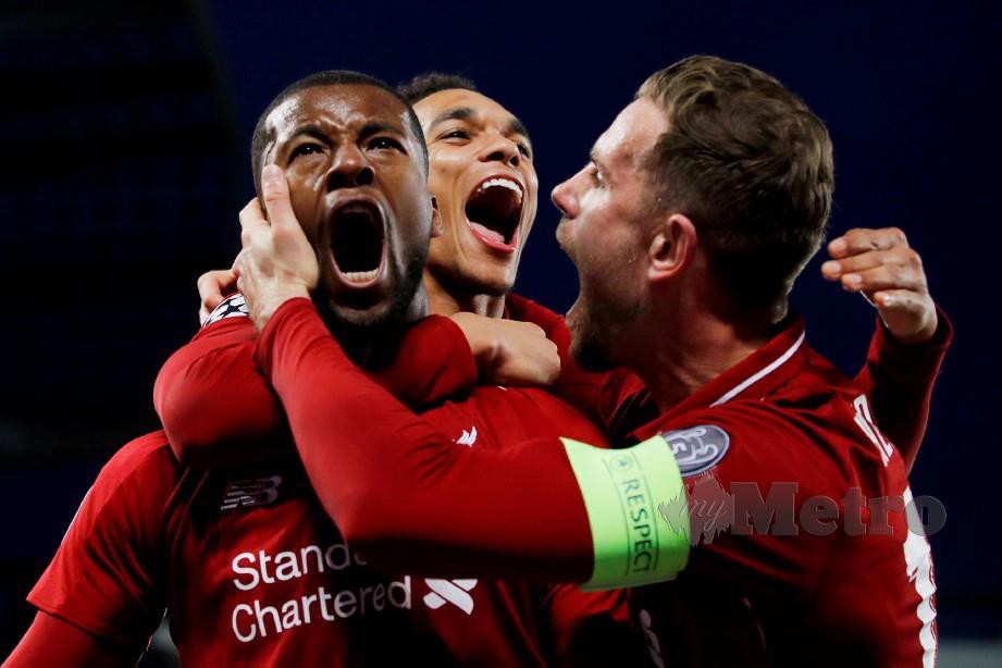 KEMARAAN Liverpool ke final Liga Juara-Juara di Madrid meningkatkan semangat pemain cuba memenangi Liga Perdana. — FOTO Reuters