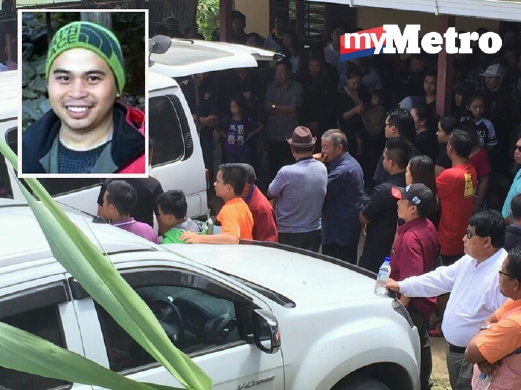 ORANG ramai memenuhi perkarangan rumah keluarga Ricky Masirin (gambar kecil) di Kundasang pagi tadi.