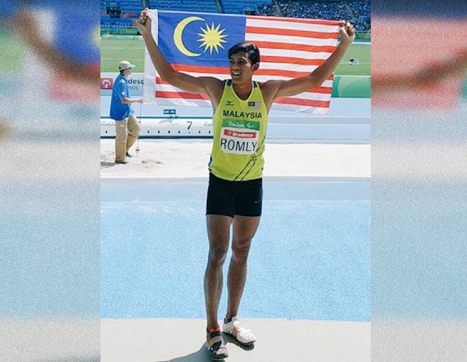 Abdul Latif  ketika memenangi pingat emas acara lompat jauh T20 Sukan Paralimpik di Rio. - Foto Fail