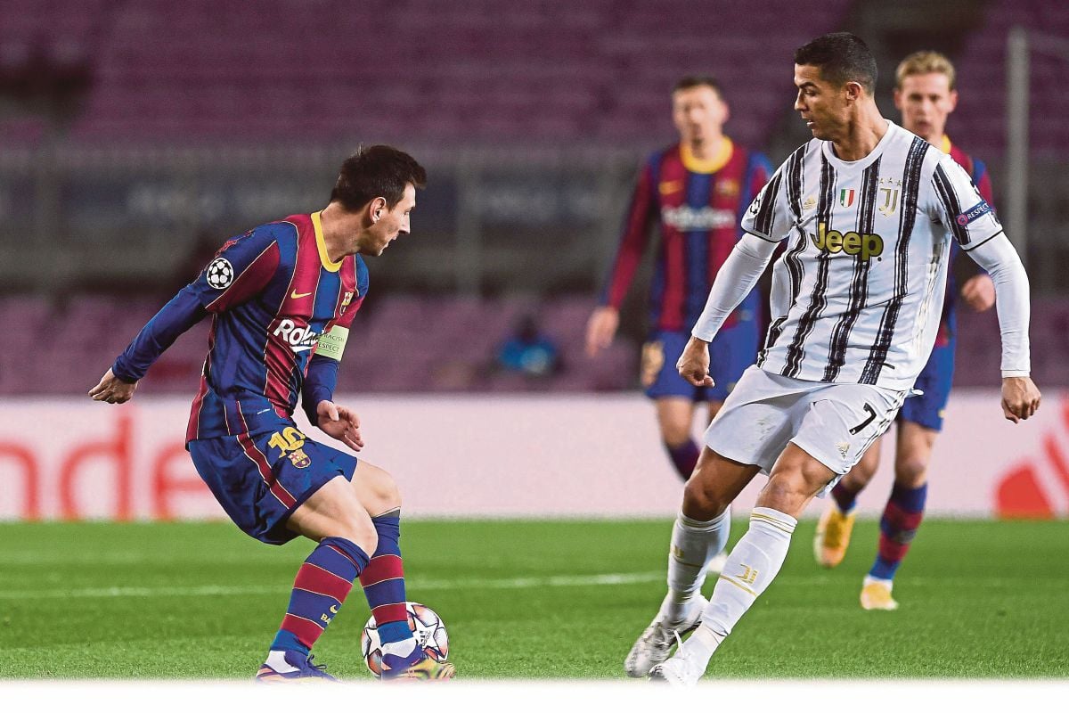 RONALDO (kanan) dan Messi sering menjadi perhatian. FOTO Agensi