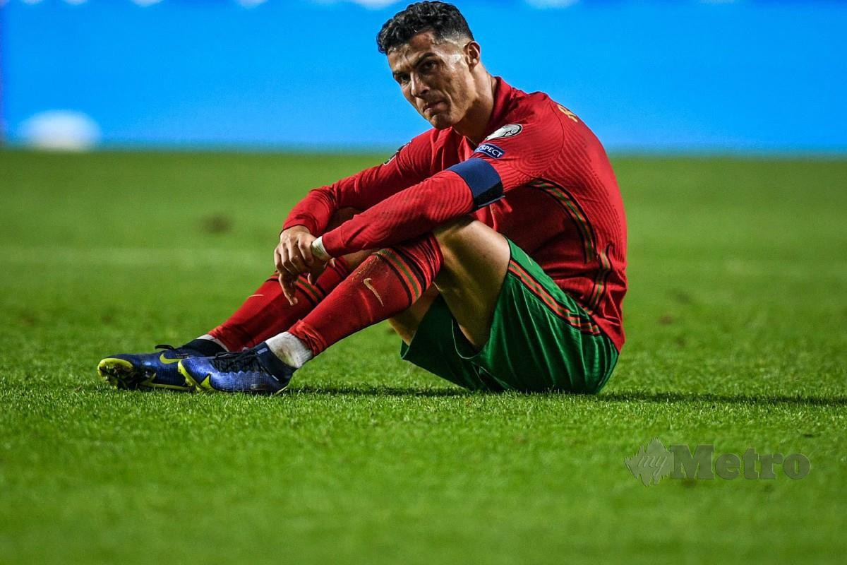 REAKSI kecewa Ronaldo selepas tamat perlawanan. FOTO AFP