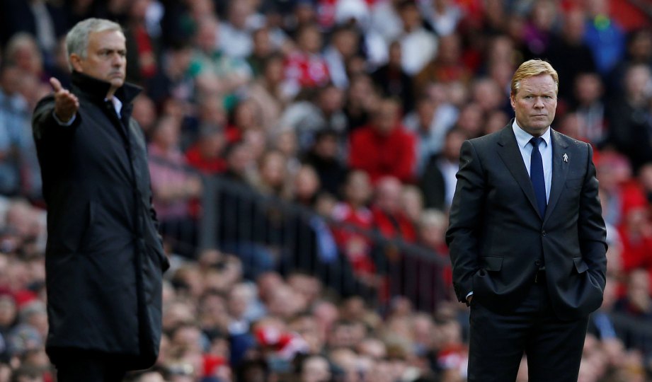RONALD Koeman (kanan) dan Jose Mourinho ketika United membelasah Everton 4-0 dalam aksi Liga Perdana Inggeris kelmarin. FOTO Reuters