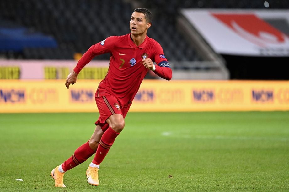 RONALDO tiada di rumah kerana tugasan bersama skuad kebangsaan Portugal. FOTO AFP 