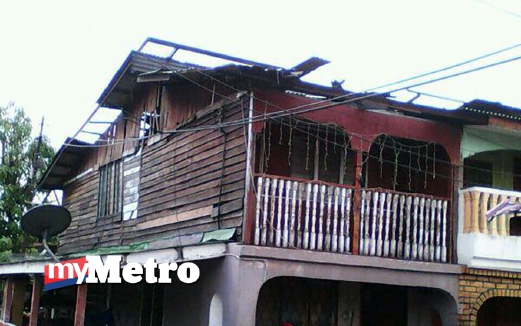 ANTARA rumah yang terjejas akibat ribut kuat. FOTO ihsan pembaca.