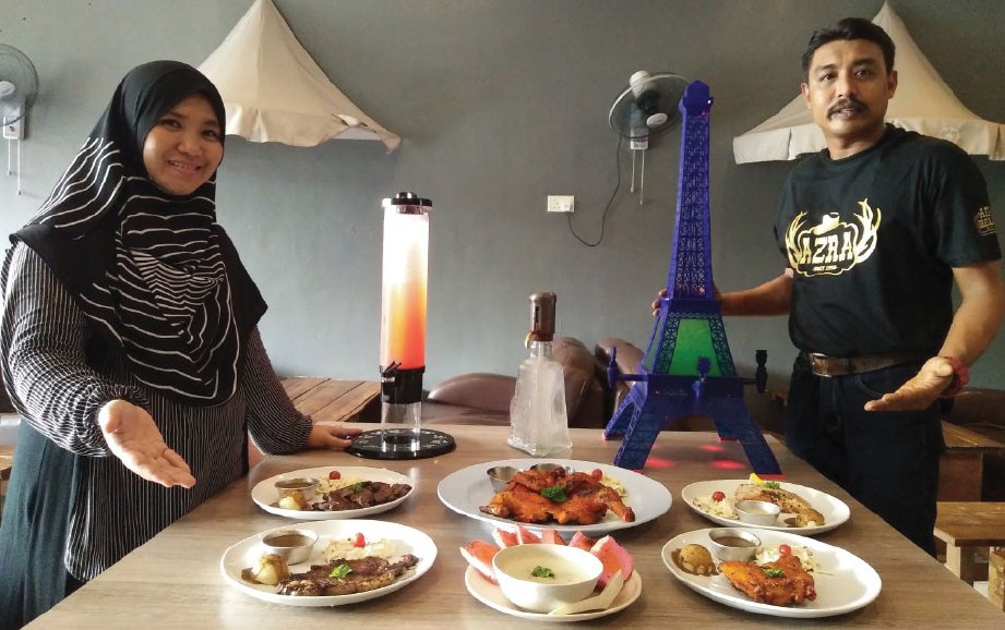 FATHI dan isteri, Shazana Razali turut menghidangkan pelbagai menu Barat di Azra Grill.