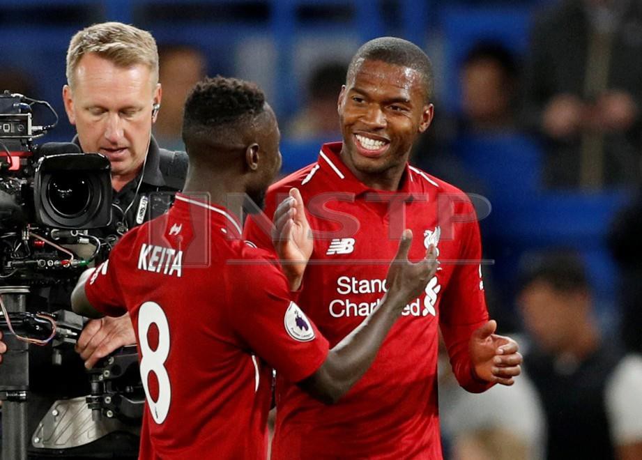 STURRIDGE (kanan) kongsi kedudukan penjaring terbanyak Liverpool dengan empat gol. -Foto Reuters