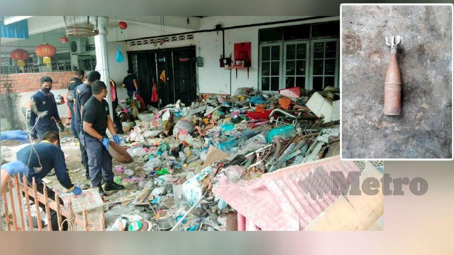 KAKITANGAN MPT membersihkan rumah yang dipenuhi longgokan sampah. (Gambar kecil) Bom mortar yang ditemui. FOTO ihsan pembaca 