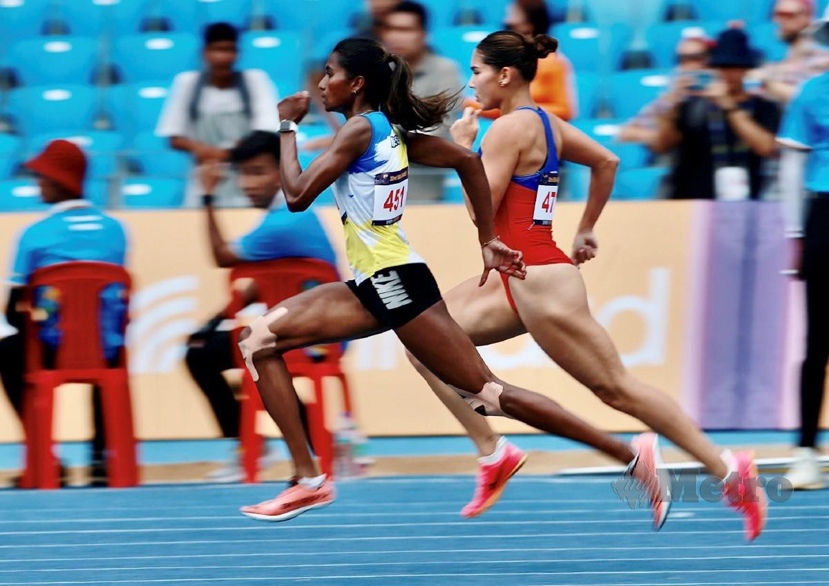 AKSI Shereen Samson Vallabouy yang memenangi acara 400m wanita di Stadium Morodok Techo. FOTO FATHIL ASRI