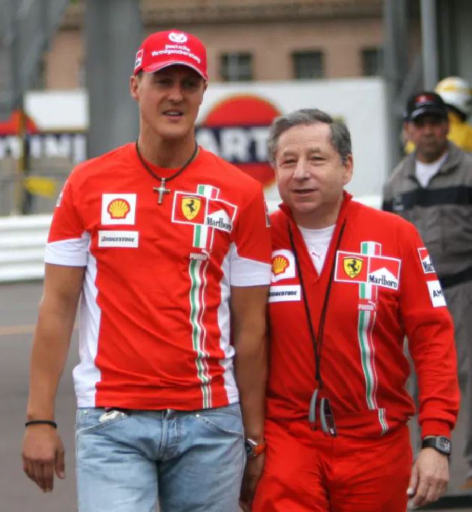 SCHUMACHER (kiri) bersama bekas prinsipal pasukan Ferrari, Jean Todt ketika zaman kegemilangan pelumba itu. FOTO Agensi 