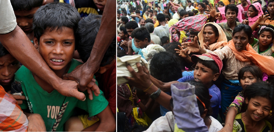 Kanak-kanak pelarian Rohingya ditahan sukarelawan ketika pelarian yang baru tiba Kutupalong, Bangladesh, berebut-rebut mengambil bantuan makanan. - Foto REUTERS/AFP