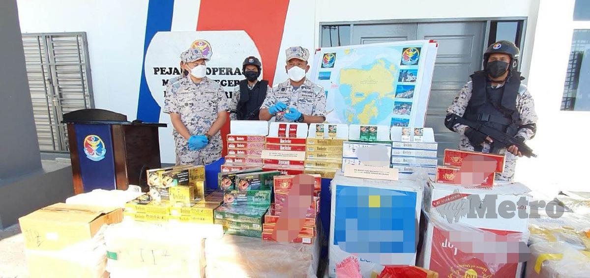 APMM Kedah dan Perlis mematahkan cubaan sindiket antarabangsa menyeludup masuk 97,500 karton rokok putih bernilai RM15.4 juta termasuk cukai menerusi Op Khas Aman di Tanjung Belua, Langkawi. FOTO HAMZAH OSMAN
