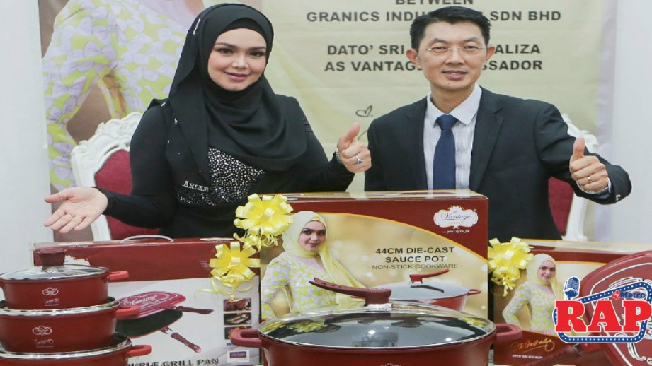 SITI Nurhaliza yang dilantik sebagai duta produk Vantage bersama Ketua Pegawai Eksekutif Granics Industries Sdn Bhd Datuk Steven Yeo. Foto HAFIZ SOHAIMI