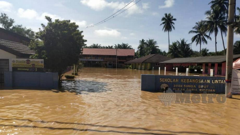 KEADAAN di SK Lintang yang ditutup akibat banjir. FOTO Ihsan PPD Kuala Kangsar
