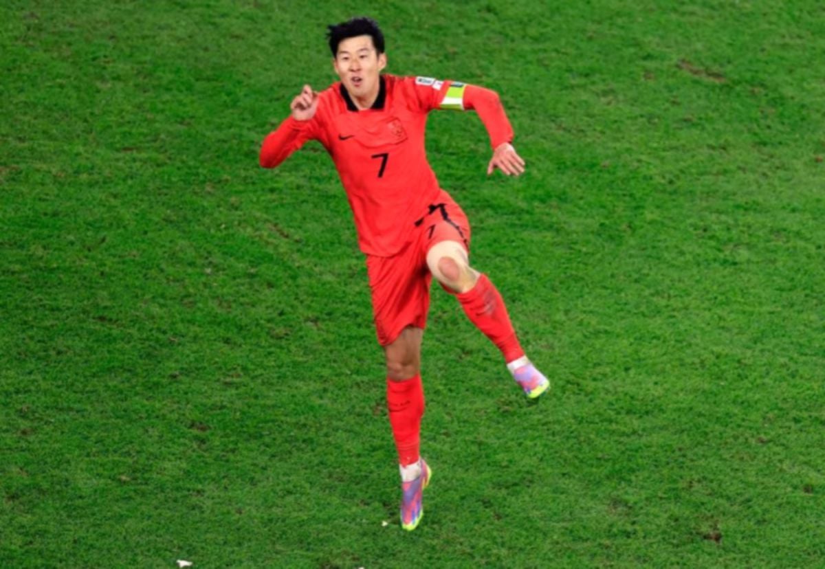SON Heung-min meraikan gol kemenangannya ke atas Australia sekaligus mara ke separuh akhir Piala Asia. FOTO Reuters