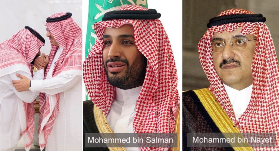 Putera Mohammed bin Salman (kiri) mencium tangan Putera Mohammed bin Nayef selepas dilantik menggantikan sepupunya itu sebagai Putera Mahkota Arab Saudi, hari ini. - Foto SPA via REUTERS