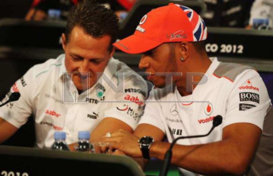 HAMILTON (kanan) tekad hampiri rekod Schumacher. FOTO/AGENSI