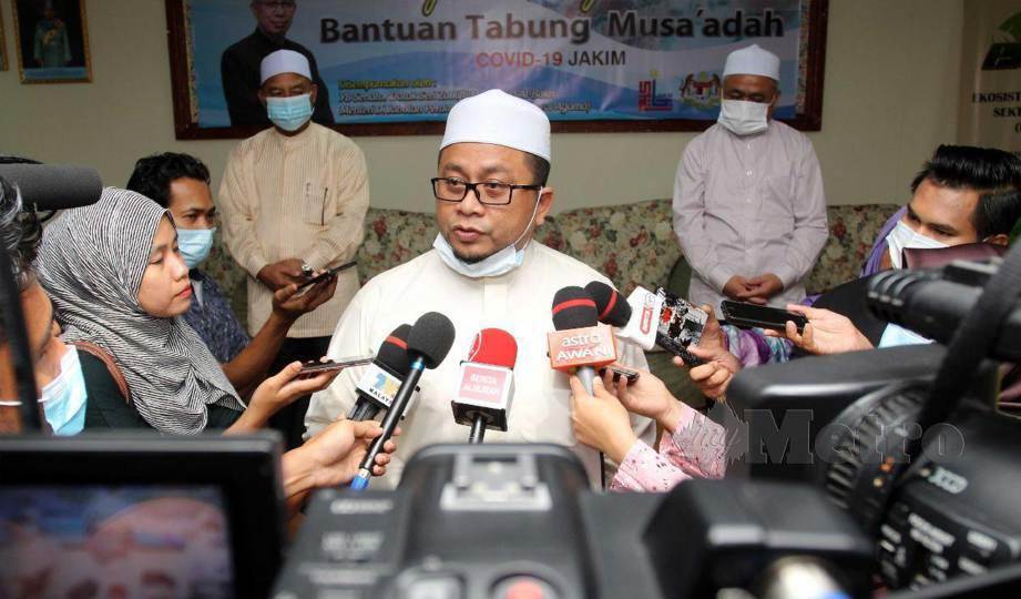 AHMAD Marzuk ketika ditemui di Majlis Penyerahan Bantuan Tabung Musa'adah Covid-19 Jakim di Dewan Majlis Agama Islam dan Adat Istiadat Melayu Kelantan (MAIK) Lundang. FOTO Nik Abdullah Nik Omar