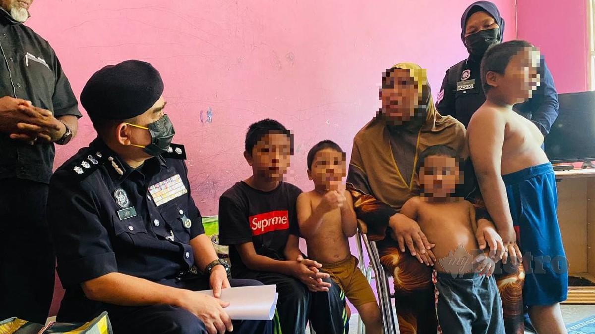 NOORZAINY (kiri) melawat wanita yang membesarkan empat cucunya selepas anak serta menantunya dimasukkan ke penjara kerana dadah. FOTO Nur Izzati Mohamad