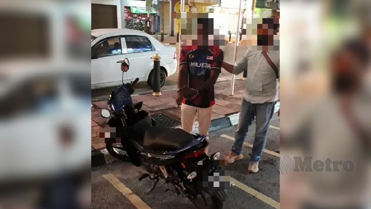 Lelaki yang disyaki terbabit kejadian samun kedai emas di Jalan TAR, Kuala Lumpur ditahan polis di sebuah hotel di Taiping, Perak hari ini. Foto Ihsan PDRM