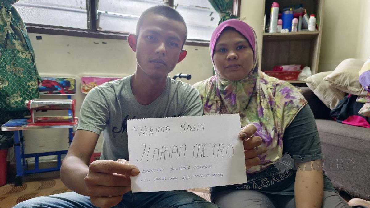 ZULKIFLI  Ainul dan Siti Nuratikah bersyukur menerima sumbangan Tabung Metro Prihatin. FOTO  Mary Victoria Dass. 