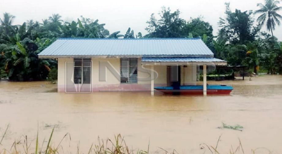 KAMPUNG Tandek Laut di Kota Marudu antara lokasi yang terjejas akibat banjir di Sabah. FOTO Recqueal Raimi 