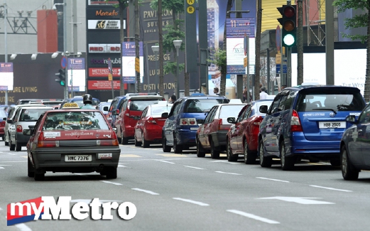 KUALA LUMPUR 12 OCTOBER 2015. Tinjauan Teksi, Uber dan Grabcar di sekitar Kuala Lumpur. NSTP/Saddam Yusoff