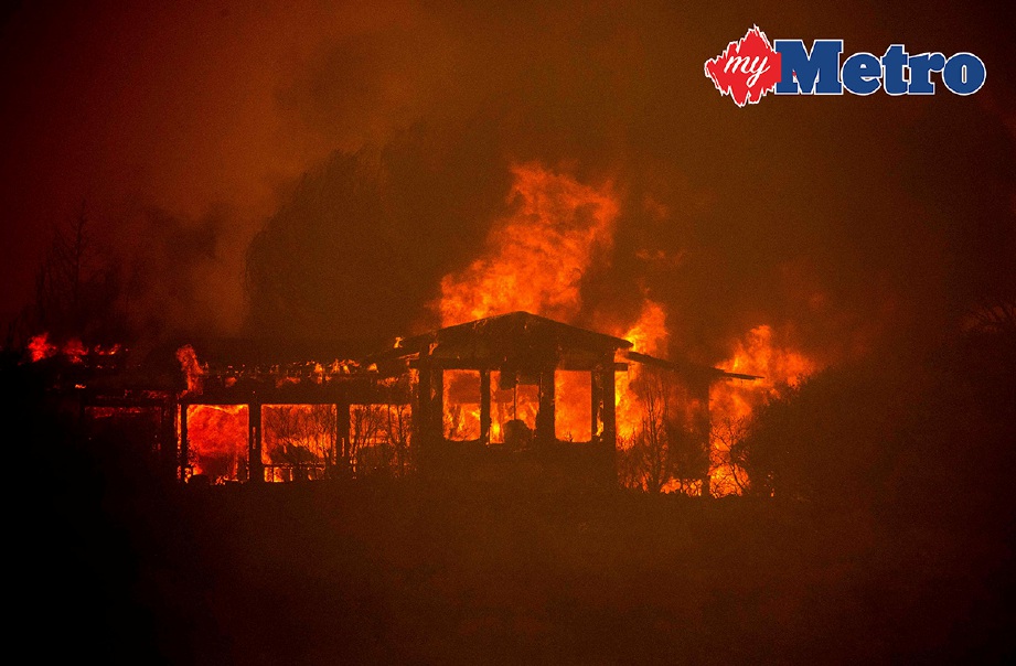 KEADAAN kawasan yang musnah akibat kebakaran di utara California. -Foto AFP