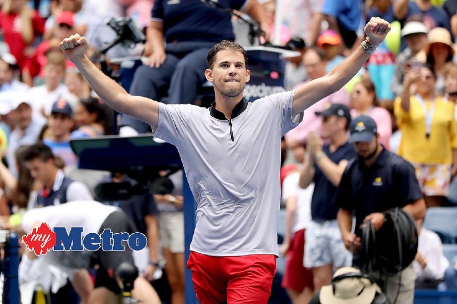 THIEM meraikan kejayaannya mengalahkan Anderson untuk bertemu Nadal di suku akhir Terbuka AS. -Foto AFP