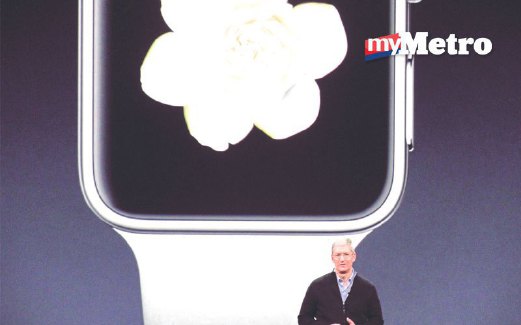 COOK mempertontonkan peranti baru Apple.