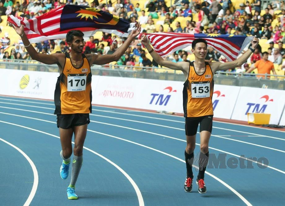 NAURAJ (kiri) menang emas lompat tinggi lelaki Sukan SEA Kuala Lumpur 2017 manakala Hup Wei pingat perak. — FOTO Yazit Razali