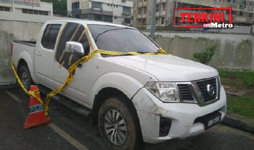 Pikap Nissan Navara yang digunakan dua pembunuh upahan yang ditembak mati. - Foto Ihsan PDRM