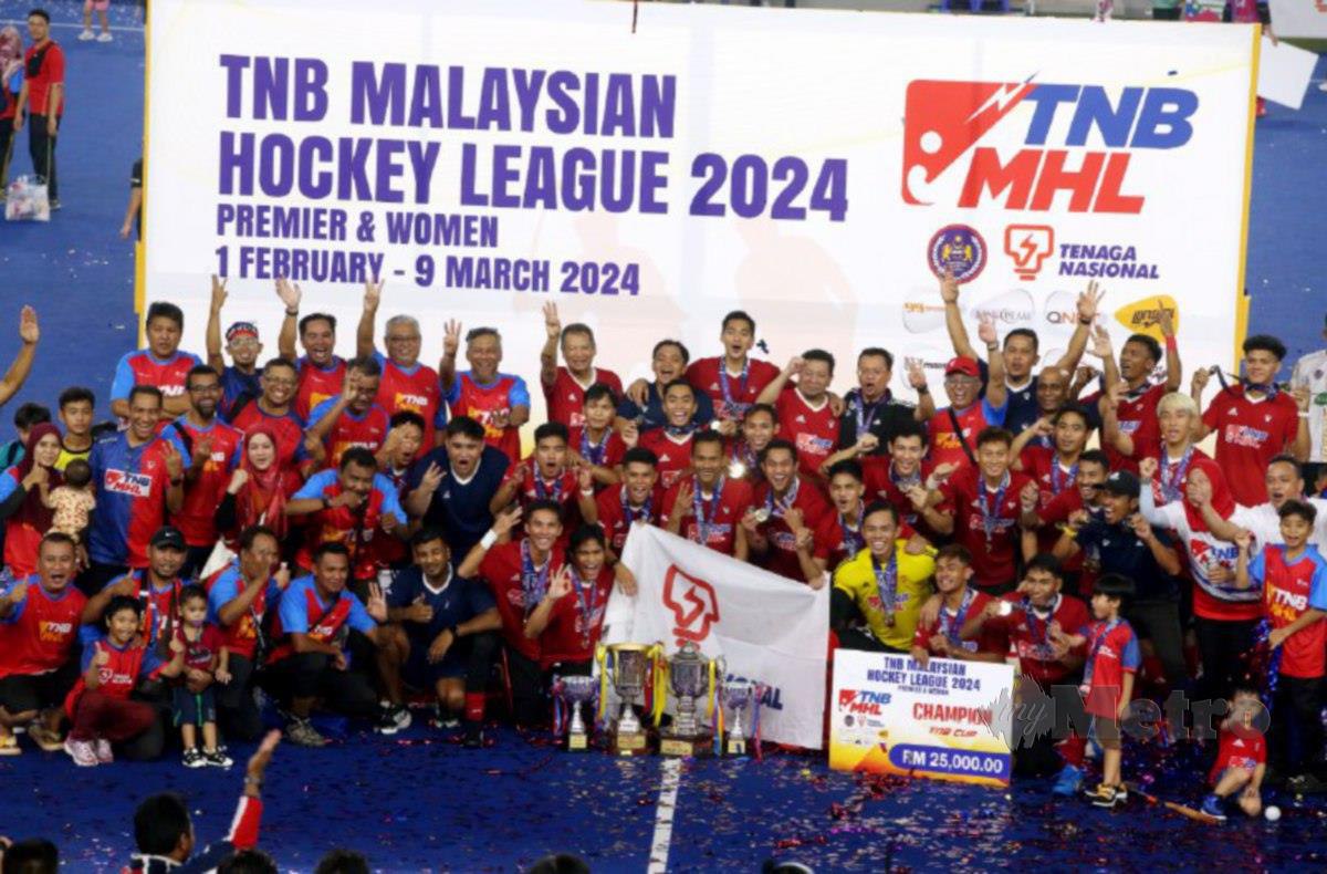 PEMAIN TNB meraikan kemenangan selepas menewaskan THT 4-2 pada perlawanan akhir Piala TNB di Stadium Hoki Nasional Bukit Jalil. FOTO HAIRUL ANUAR RAHIM