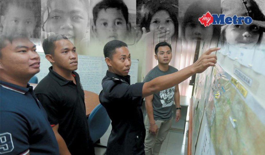 PEGAWAI Medan Ops Tohoi, Inspektor Harris Turung (dua dari kanan) melihat kembali tempat murid yang hilang ditemui.