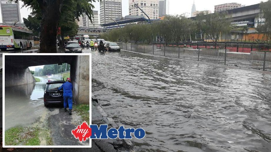 Beberapa lokasi di ibu kota dilanda banjir selepas hujan lebat lebih dua jam bermula 3.40 petang hari ini. FOTO ihsan APM