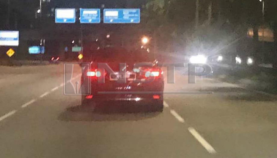 TONTO mengekori kenderaan anggota penguatkuasa JIM sejauh kira-kira 30 kilometer dari Kuala Lumpur ke Putrajaya selepas premis hiburan di Taman Shamelin Perkasa diserbu dan 73 GRO ditahan, malam tadi. FOTO ihsan JIM.