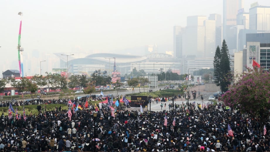 HIMPUNAN menyokong Uighur di Hong Kong pada 22 Disember lalu. FOTO Reuters