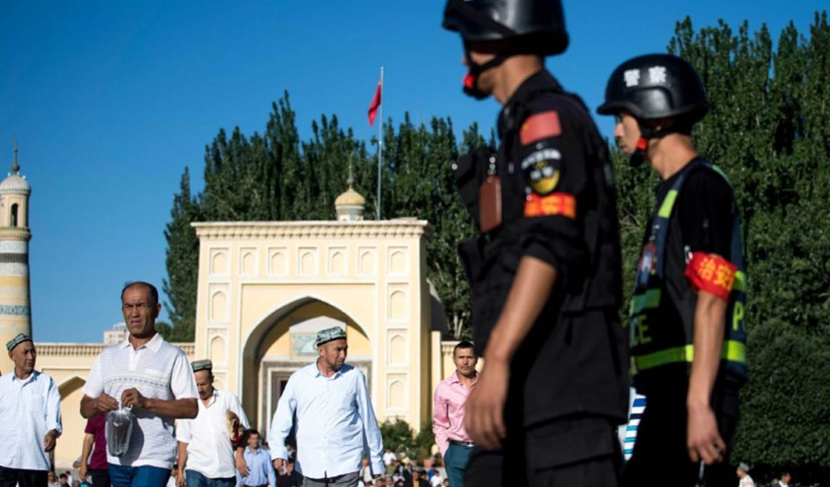 SETIAP tahanan etnik Uighur di pusat tahanan dan kem latihan di wilayah barat, China dipaksa makan daging babi setiap Jumaat. FOTO AFP