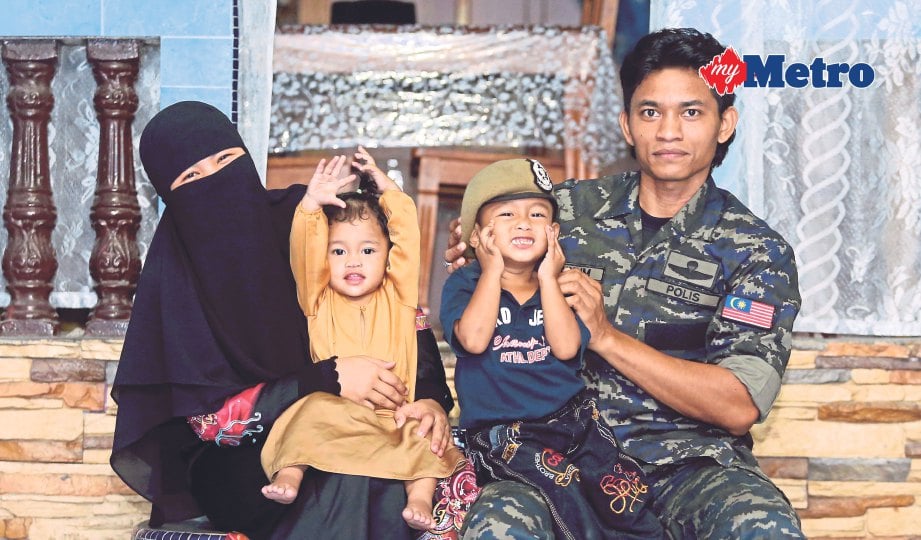 MOHD Qaiyum bersama isteri dan anak. FOTO Zulfadhli Zulkifli