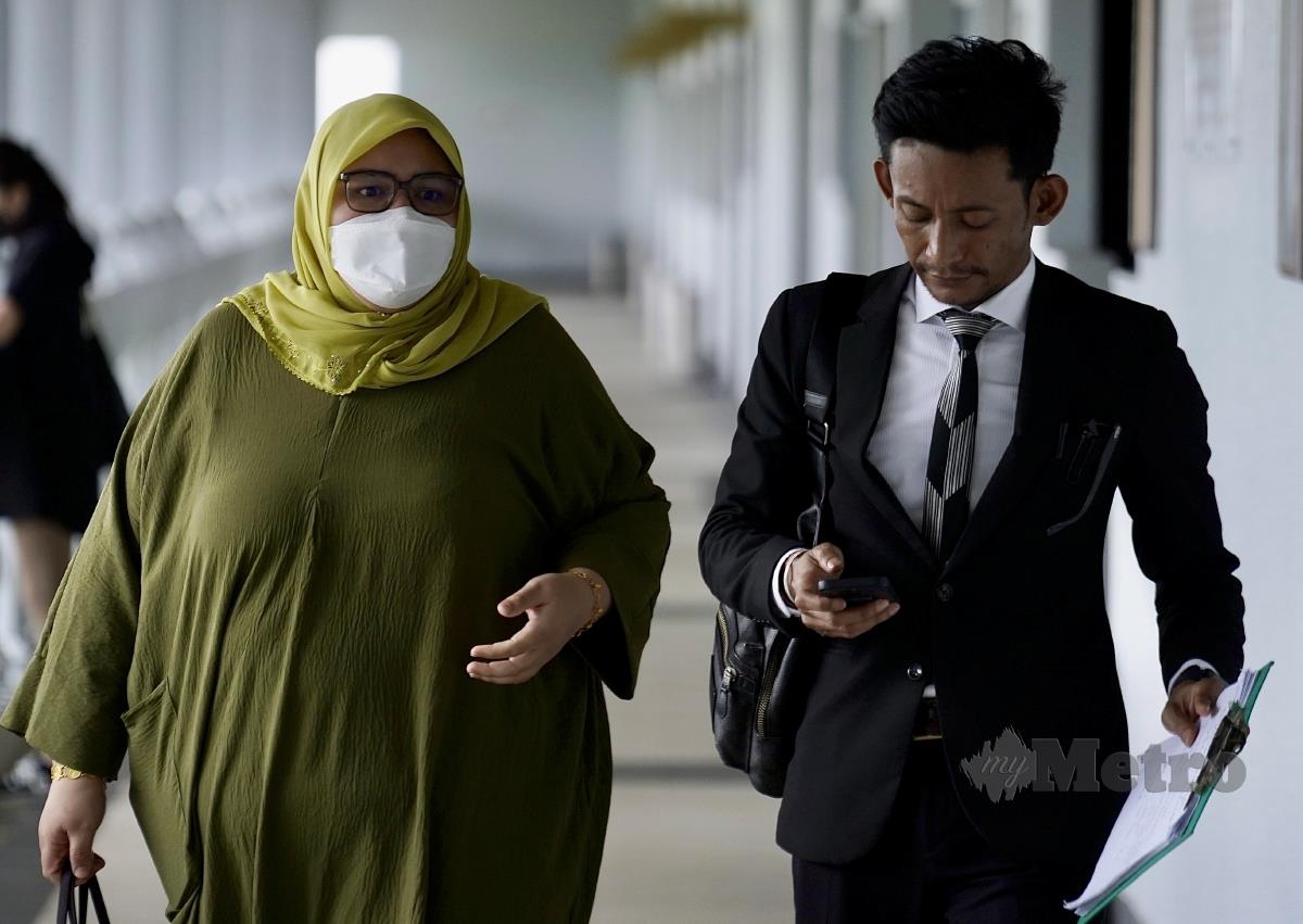 Siti Bainun hadir untuk perbicaraan kes atas dakwaan menganiaya dan mengabaikan seorang remaja Sindrom Down di Mahkamah Sesyen Jenayah, di Mahkmah Kuala Lumpir. FOTO FATHIL ASRI