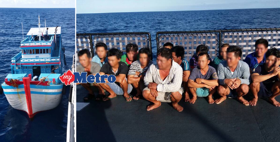Tekong dan awak-awak bot nelayan Vietnam yang ditahan. - Foto Ihsan APMM