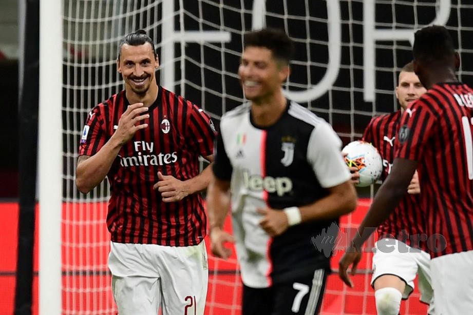 Zlatan Ibrahimovic (kiri) ketika beraksi dalam saingan Serie A. FOTO AFP