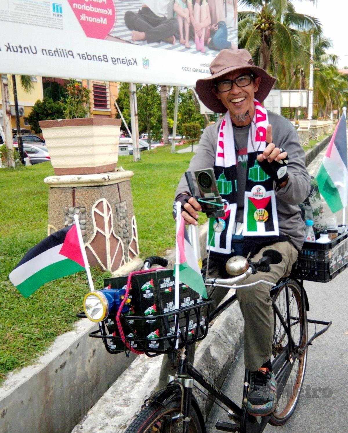 Zul Yahya berbasikal secara solo sejauh 1,384km. Foto Ihsan Pembaca